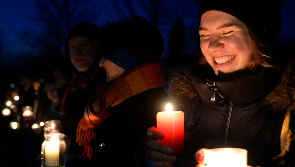 CANDLELIGHT VIGIL WOMAN