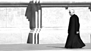 PRIEST WALKING