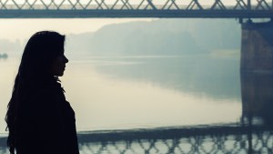 DEPRESSED WOMAN BRIDGE