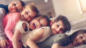 FIVE CHILDREN LAUGHING