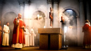 PRIEST AT MASS,ALTER,INCENSE