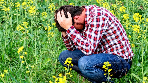 MAN KNEELING DOWN,UPSET