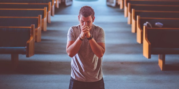 MAN,PRAYING,ALTAR