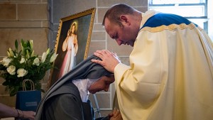 PRIEST BLESSING SISTER