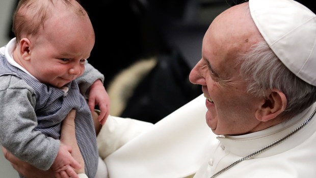 POPE FRANCIS HOLDS BABY BOY