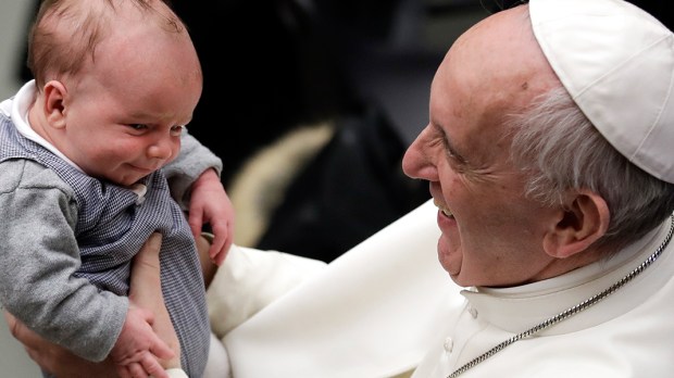 POPE FRANCIS HOLDS BABY BOY