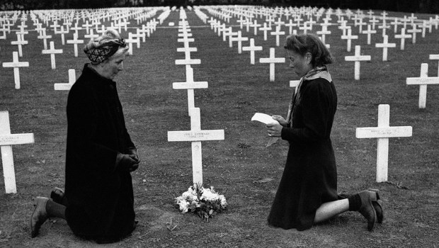 WOMAN PRAYING ON D DAY