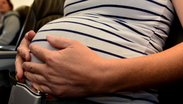 PREGNANT,WOMAN,AIRPLANE