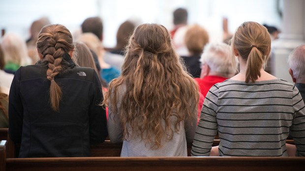 YOUNG WOMEN AT MASS