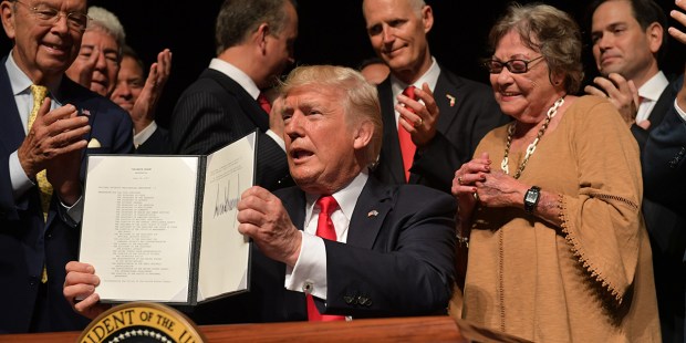 PRESIDENT TRUMP SIGNS CUBA POLICY