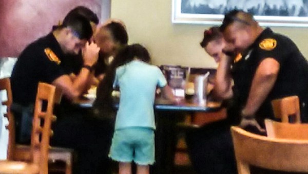 YOUNG GIRL,PRAYS,COPS