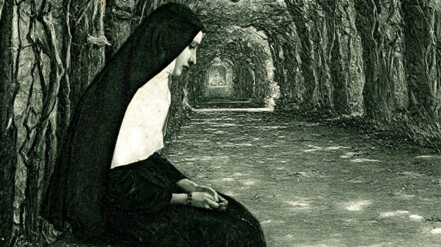 NUN SITTING ON BENCH,FOREST