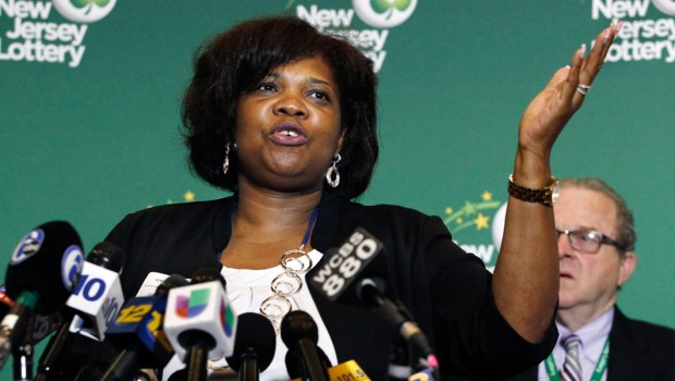 WOMAN SPEAKING AT PRESS CONFERENCE