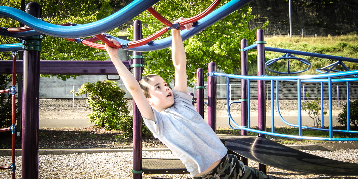 KID ON PLAYGROUND
