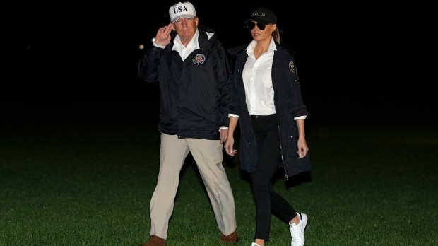 US President Donald Trump and First Lady Melania Trump return from Texas