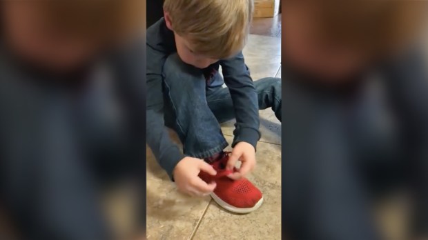 Colton Tying Shoes