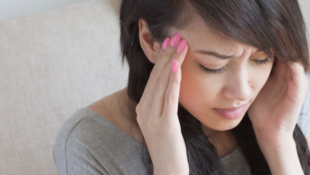 HEADACHE,WOMAN
