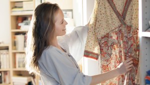 Woman Choosing Clothing