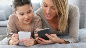 Mom and Daughter on Phones