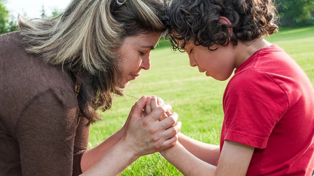 Mother and Son Praying