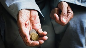 Old Man Holding Money