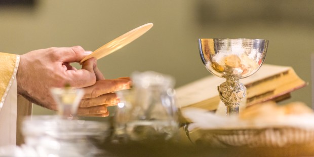 OFFERTORY;PRIEST WITH HOST