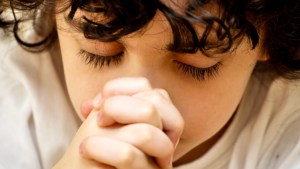 CHILD PRAYING