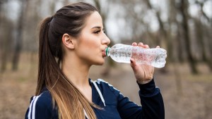 WOMAN,HIKING,WATER,BOTTLE