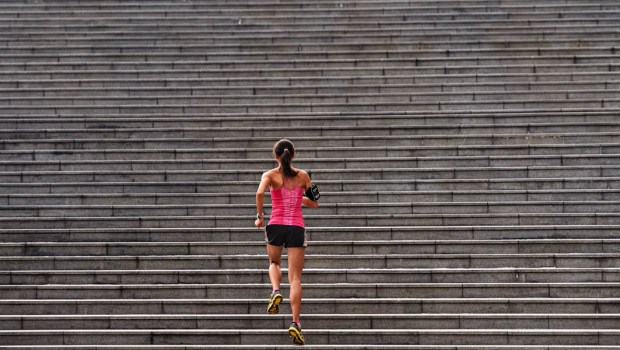 WOMAN RUNNING STAIRS