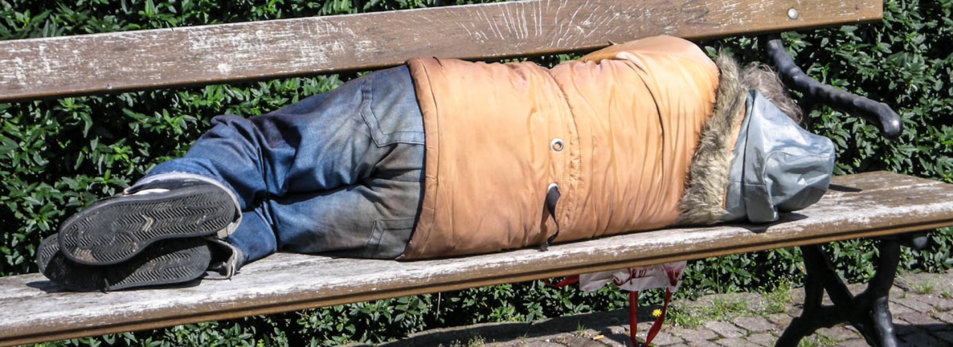 HOMELESS MAN ON BENCH