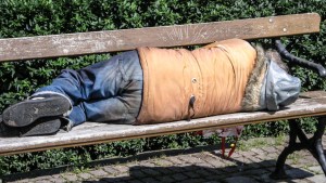 HOMELESS MAN ON BENCH