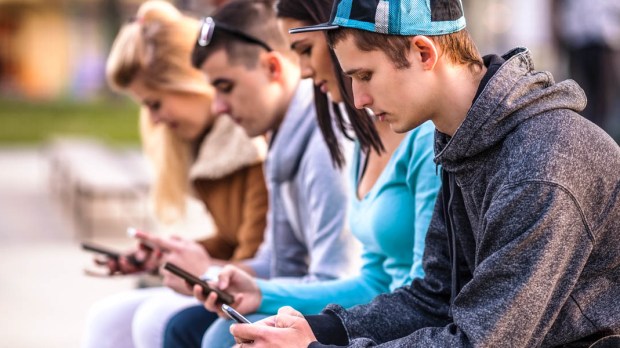 TEENAGERS ON DEVICES