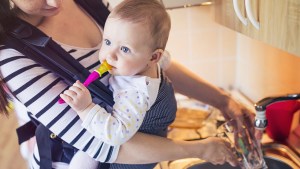 Mother Multitasking with Child