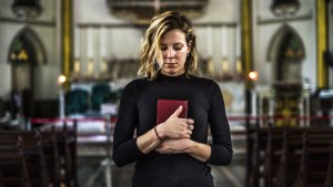 WOMAN WITH PRAYER BOOK