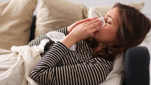 WOMAN,SICK,COUCH