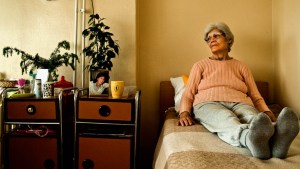 WOMAN ALONE IN BED