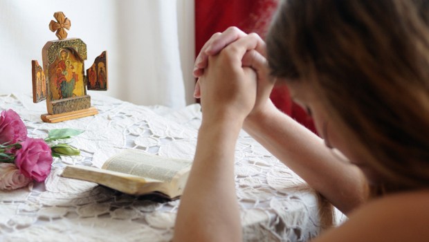 Young girl praying