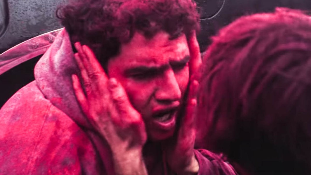 MAN COVERED IN PINK DUST