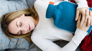 WOMAN,SICK,COUCH