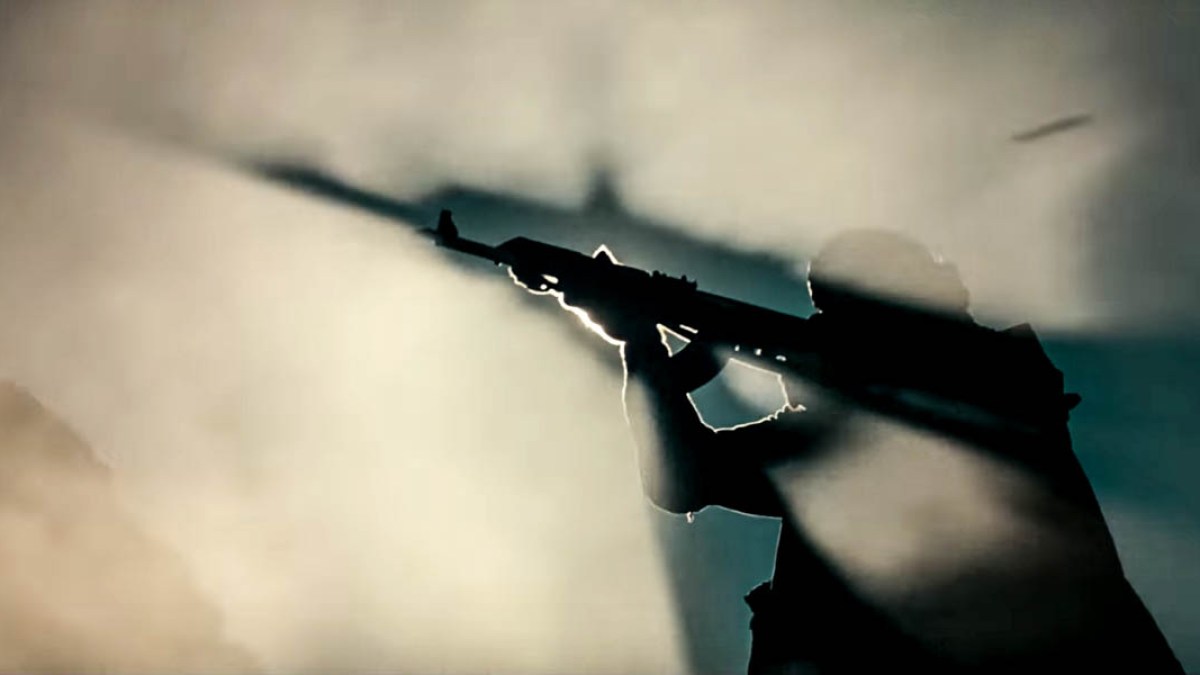 MAN SHOOTING GUN
