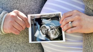 PARENTS HOLDING ULTRASOUND