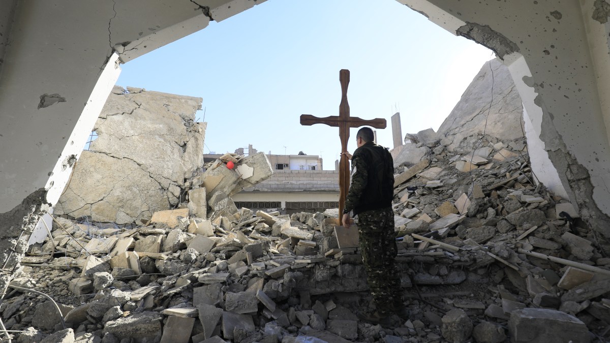 RAQA CROSS