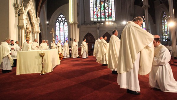 PRIEST BEING ORDAINED