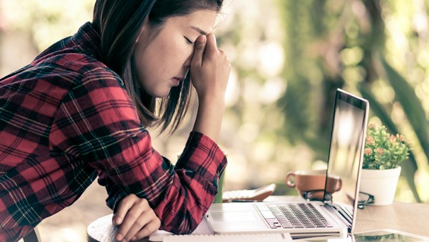 OVERWORKED WOMAN