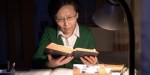 WOMAN READING