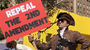 PROTESTOR WITH SIGN