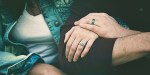 COUPLE HOLDING HANDS