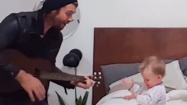 FATHER SINGING TO DAUGHTER