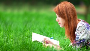 WOMAN,PARK,JOURNAL