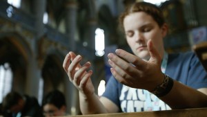 GIRL PRAYING CHURCH